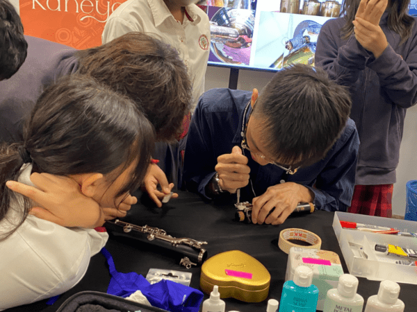 Hands-On Instrument Maintenance Workshop for Young Students: Kane Music at HELP International School